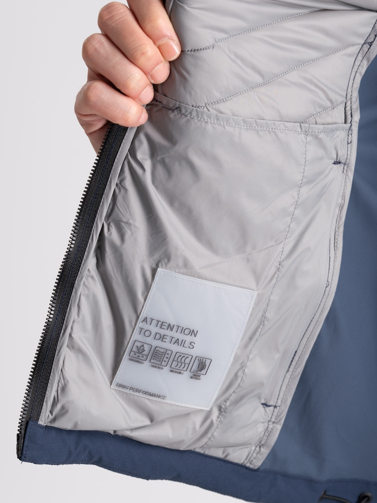 Giubbino uomo sportivo con due tessuti e imbottitura davanti